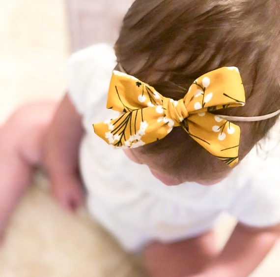 mustard baby bow