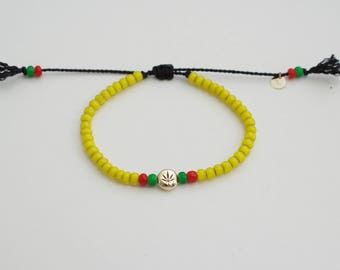 Yellow Rasta Bracelet: Adjustable African Glass Bead, Sterling Silver Charm