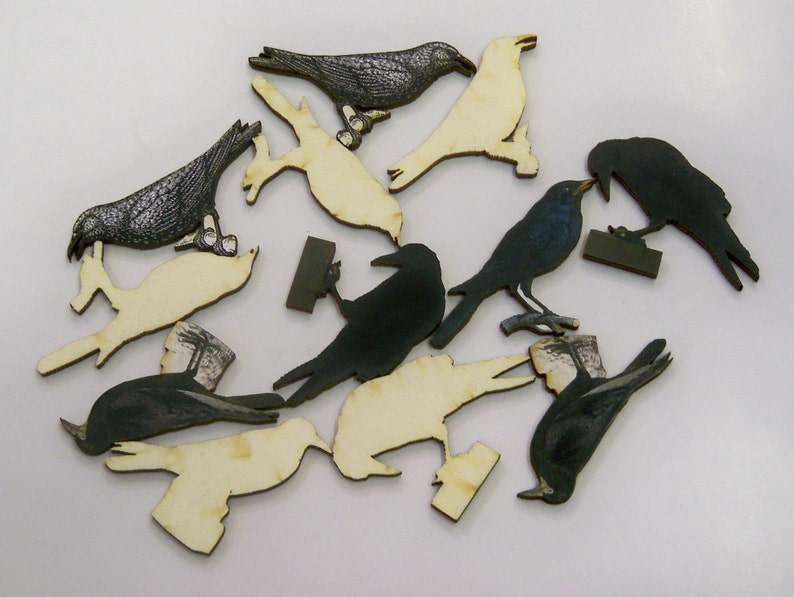 A packet of 12 x woodcuts Black Bird Black Crows and Ravens