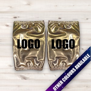 May include: A pair of gold metallic leg warmers with the word "LOGO" printed in black on each warmer.  Other colors are available.