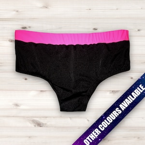 May include: Black underwear with a pink waistband. The underwear is made of a stretchy, comfortable fabric.