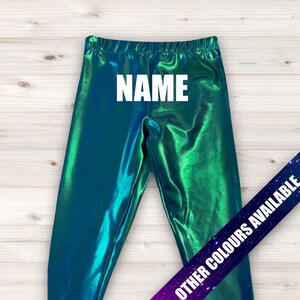 May include: Green and blue iridescent leggings with the word "NAME" printed in white on the back.  Other colors are available.
