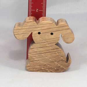 Handmade, stackable toy puppy dog cutout from the Itty Bitty Animal Collection. Unfinished and unpainted, crafted for creative play. Smoothly sanded and ready to be personalized with your favorite colors.