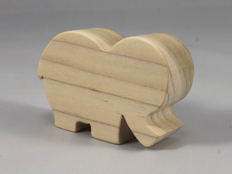 Handmade wooden toy Elephant cutout from the Itty Bitty Animal Collection stackable and unfinished crafted with traditional tools in the USA. Ideal for kid's crafts or pretend play, ready to be personalized to inspire creativity and imagination.