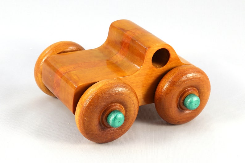 Wood Toy Monster Pickup Truck handmade in the USA from select hardwood finished with amber shellac with metallic emerald green trim. From my Play Pal Collection.