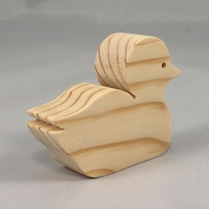 Handcrafted 2 inchwooden toy duck cutout made from 3/4-inch thick wood.