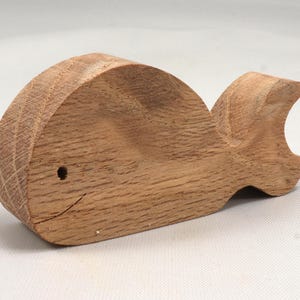 Handmade unfinished wooden whale toy cutout, chunky freestanding and stackable, sanded smooth and ready to paint, natural wood blank for kids craft and ocean theme play.