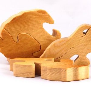 A wooden four piece puzzle in the shape of a rabbit. Perfect toddlers first puzzle.