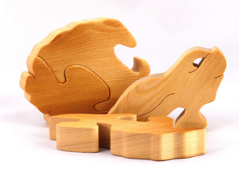 A wooden four piece puzzle in the shape of a rabbit. Perfect toddlers first puzzle.