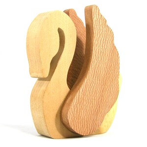 Handmade wooden swan figurine crafted from contrasting reclaimed hardwoods, sanded and ready to finish, and made in the USA.
