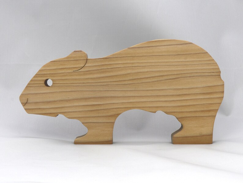 Handmade Wooden Stacking Puzzle Guinea Pig Family, Mom, and Babies finished with a non-toxic custom blend of mineral oil and waxes. This wooden toy animal is perfect for imaginative play and an excellent gift for children.