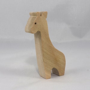 Handmade wooden giraffe cutout, unfinished, ready to paint, and freestanding. Perfect for a young child's imaginative play, stacking, or crafting.