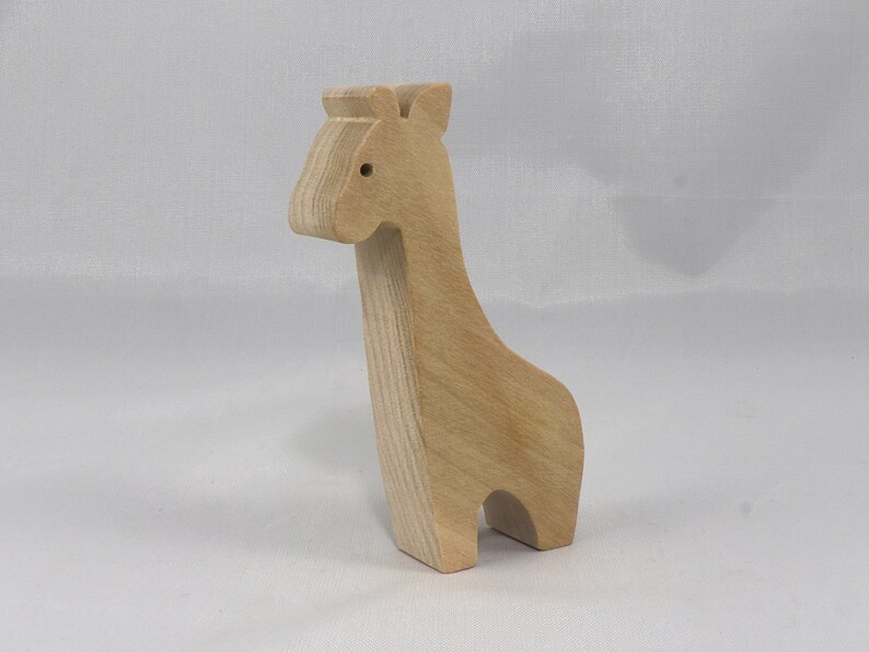Handmade wooden giraffe cutout, unfinished, ready to paint, and freestanding. Perfect for a young child's imaginative play, stacking, or crafting.