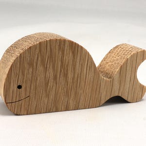 Handmade unfinished wooden whale toy cutout, chunky freestanding and stackable, sanded smooth and ready to paint, natural wood blank for kids craft and ocean theme play.