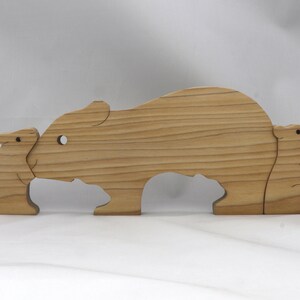 Handmade Wooden Stacking Puzzle Guinea Pig Family, Mom, and Babies finished with a non-toxic custom blend of mineral oil and waxes. This wooden toy animal is perfect for imaginative play and an excellent gift for children.