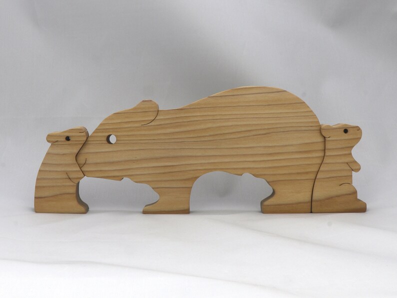 Handmade Wooden Stacking Puzzle Guinea Pig Family, Mom, and Babies finished with a non-toxic custom blend of mineral oil and waxes. This wooden toy animal is perfect for imaginative play and an excellent gift for children.