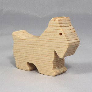 Handmade wood toy Scottie dog cutout unfinished unpainted paintable freestanding Itty Bitty Animal Collection. Approximate size 2.5 inches length by 2 inches height by 0.75 inches width. Handmade in Tallahassee Florida USA from natural wood offcuts.