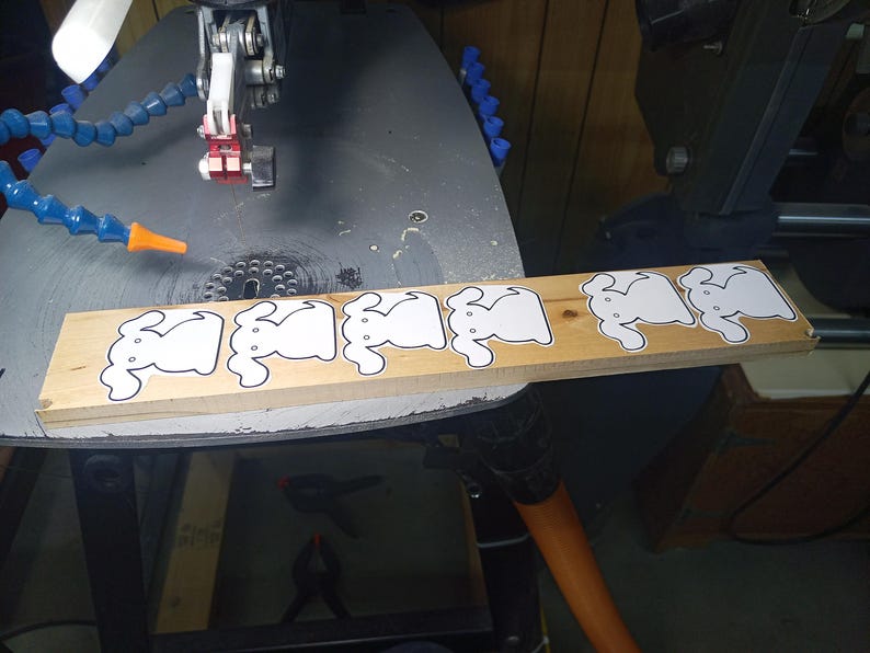 This is an unfinished wooden Puppy Dog cutout from solid wood using traditional woodworking techniques. Sanded smooth and ready to paint, stain, or customize. Freestanding design for small hands, toddlers, young children, crafters, collectors, and display. I take custom orders for any animal, quantity, and mix — including large ornament orders. Mix and match, request a different size, or send a drawing or pattern. Handmade by Odin's Toy Factory in Tallahassee, Florida, USA.