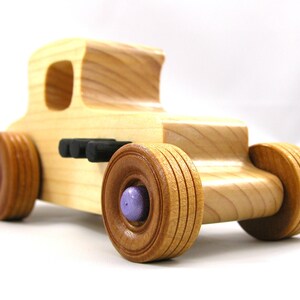 Handmade wooden toy car Hot Rod '27 T-Coupe handmade and finished with nontoxic amber shellac with metallic purple and black trim. From my Hot Rod Collection.
