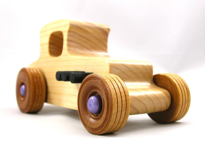 Handmade wooden toy car Hot Rod '27 T-Coupe handmade and finished with nontoxic amber shellac with metallic purple and black trim. From my Hot Rod Collection.