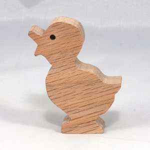 Wooden duck cutout, handmade, unfinished, and unpainted, from the Itty Bitty Animal Collection. Natural wood, freestanding, stackable, and paintable. Suitable for crafts or toys, American-made