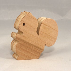 Handmade wood toy squirrel cutout is unfinished, unpainted, paintable, ready to paint, and freestanding from my Itty Bitty Animal Collection.