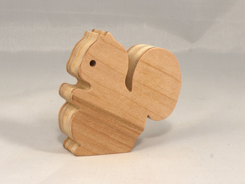 Handmade wood toy squirrel cutout is unfinished, unpainted, paintable, ready to paint, and freestanding from my Itty Bitty Animal Collection.