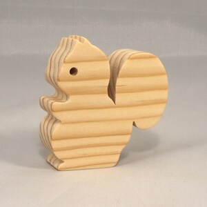Handmade wood toy squirrel cutout is unfinished, unpainted, paintable, ready to paint, and freestanding from my Itty Bitty Animal Collection.