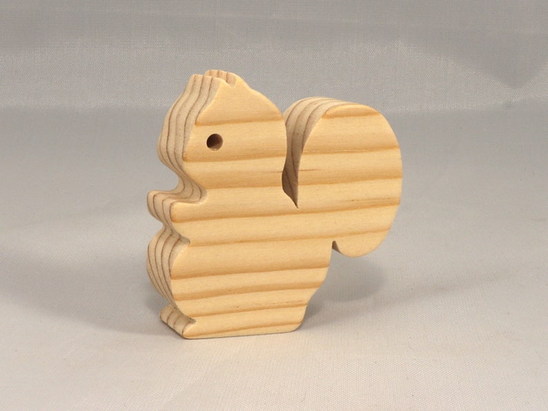 Handmade wood toy squirrel cutout is unfinished, unpainted, paintable, ready to paint, and freestanding from my Itty Bitty Animal Collection.