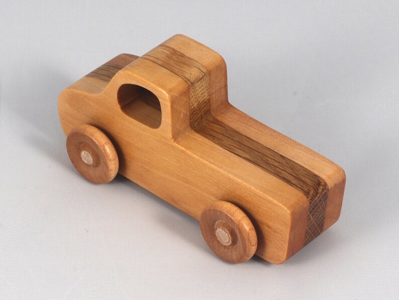 Handmade wooden toy pickup truck handmade from oak, poplar, and birch hardwoods with a satin polyurethane finish from my Play Pal Collection.