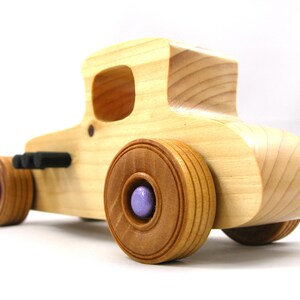 Handmade wooden toy car Hot Rod '27 T-Coupe handmade and finished with nontoxic amber shellac with metallic purple and black trim. From my Hot Rod Collection.