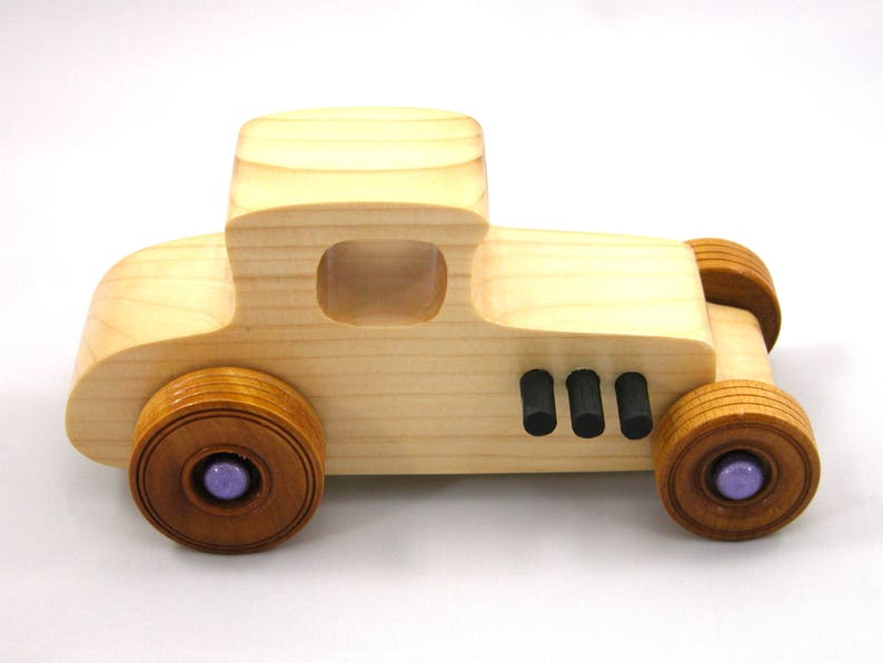 Handmade wooden toy car Hot Rod '27 T-Coupe handmade and finished with nontoxic amber shellac with metallic purple and black trim. From my Hot Rod Collection.
