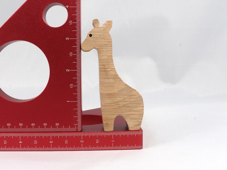 Handmade wooden giraffe cutout, unfinished, ready to paint, and freestanding. Perfect for a young child's imaginative play, stacking, or crafting.