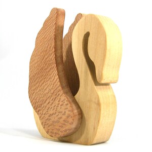 Handmade wooden swan figurine crafted from contrasting reclaimed hardwoods, sanded and ready to finish, and made in the USA.