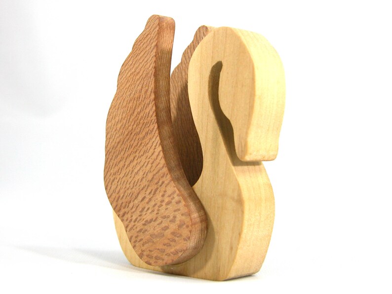 Handmade wooden swan figurine crafted from contrasting reclaimed hardwoods, sanded and ready to finish, and made in the USA.
