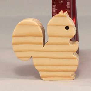 Handmade wood toy squirrel cutout is unfinished, unpainted, paintable, ready to paint, and freestanding from my Itty Bitty Animal Collection.