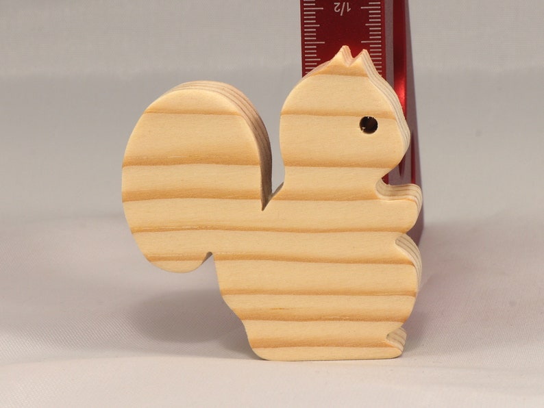 Handmade wood toy squirrel cutout is unfinished, unpainted, paintable, ready to paint, and freestanding from my Itty Bitty Animal Collection.