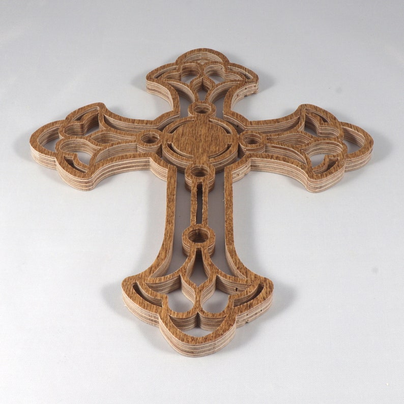 This beautiful handmade rustic fretwork cross is made from reclaimed hardwood flooring samples and adds a touch of rustic elegance to your home.