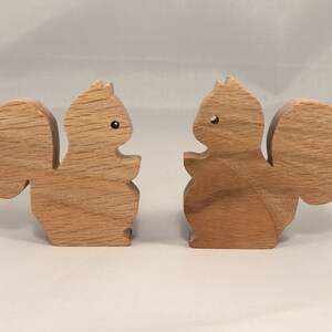 Handmade wood toy squirrel cutout is unfinished, unpainted, paintable, ready to paint, and freestanding from my Itty Bitty Animal Collection.