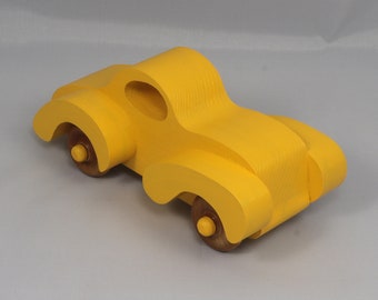 Wooden Toy Car Push Toy In The Vintage Style Of A Fat Fendered Coupe Painted Bright Yellow With Nonmarring Amber Shellac Wheels