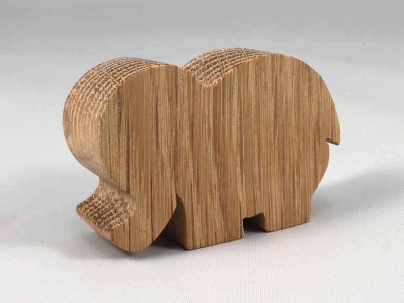 Handmade wooden toy Elephant cutout from the Itty Bitty Animal Collection stackable and unfinished crafted with traditional tools in the USA. Ideal for kid's crafts or pretend play, ready to be personalized to inspire creativity and imagination.
