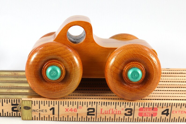 Wood Toy Monster Pickup Truck handmade in the USA from select hardwood finished with amber shellac with metallic emerald green trim. From my Play Pal Collection.