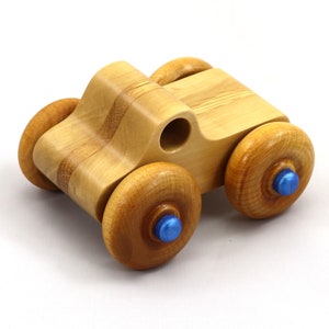 Handmade wooden toy pickup truck with a durable satin polyurethane finish and metallic sapphire blue trim from My Play Pal collection.