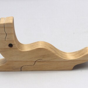Handmade Wood Alligator Family Stacking Puzzle Mom and five baby (hatchling) alligators. This freestanding puzzle is hand-finished with a custom blend of mineral oil and waxes for a beautiful, smooth, and durable finish.