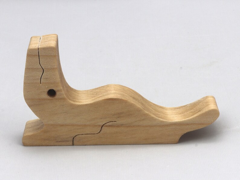Handmade Wood Alligator Family Stacking Puzzle Mom and five baby (hatchling) alligators. This freestanding puzzle is hand-finished with a custom blend of mineral oil and waxes for a beautiful, smooth, and durable finish.
