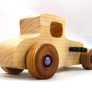 Handmade wooden toy car Hot Rod '27 T-Coupe handmade and finished with nontoxic amber shellac with metallic purple and black trim. From my Hot Rod Collection.