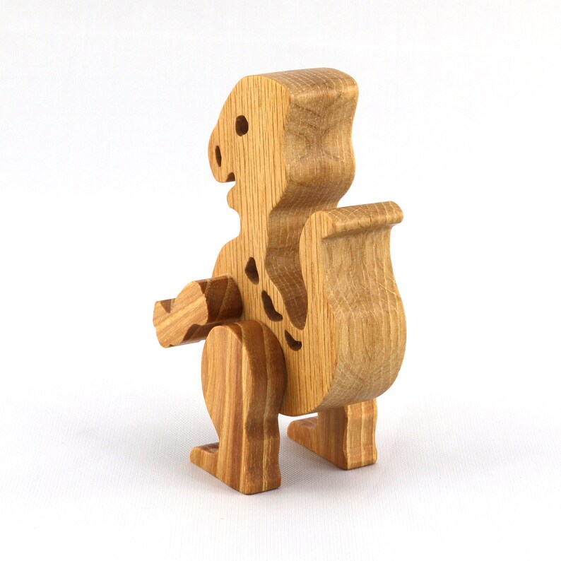 Wooden baby dinosaur figurine from My Buddies Dinos collection. Handmade with select grade hardwoods and finished with mineral oil and beeswax.