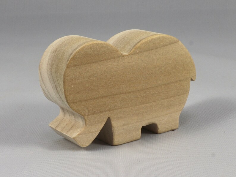Handmade wooden toy Elephant cutout from the Itty Bitty Animal Collection stackable and unfinished crafted with traditional tools in the USA. Ideal for kid's crafts or pretend play, ready to be personalized to inspire creativity and imagination.