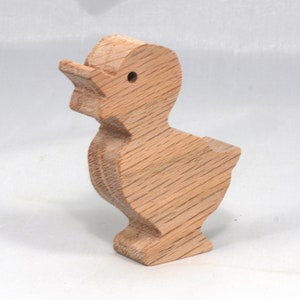 Wooden duck cutout, handmade, unfinished, and unpainted, from the Itty Bitty Animal Collection. Natural wood, freestanding, stackable, and paintable. Suitable for crafts or toys, American-made