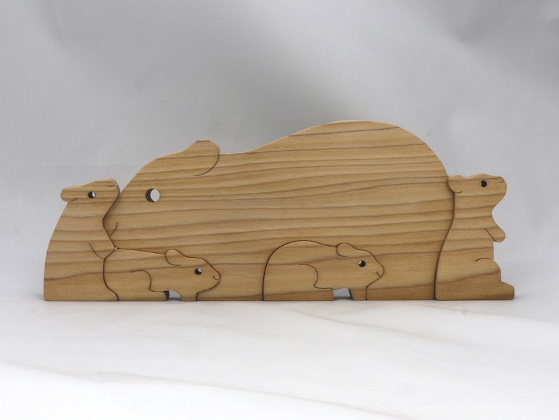 Handmade Wooden Stacking Puzzle Guinea Pig Family, Mom, and Babies finished with a non-toxic custom blend of mineral oil and waxes. This wooden toy animal is perfect for imaginative play and an excellent gift for children.